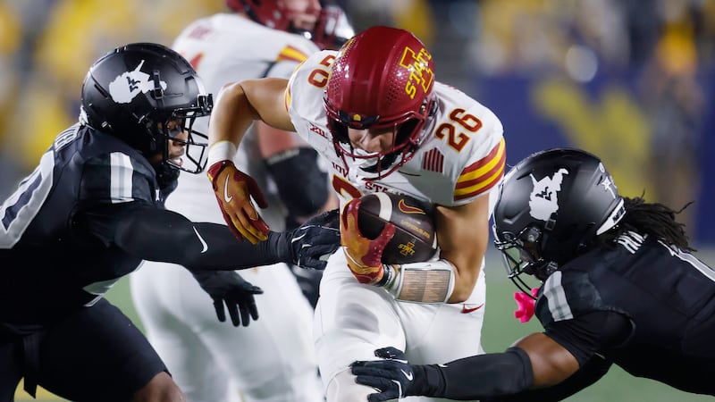 Iowa State running back Carson Hansen (26) picks up yardage during the second quarter of an...