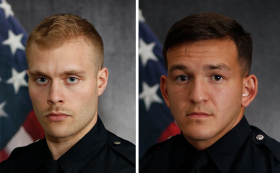 Omaha Police officers Alex Atkinson, left; and Noah Zendejas