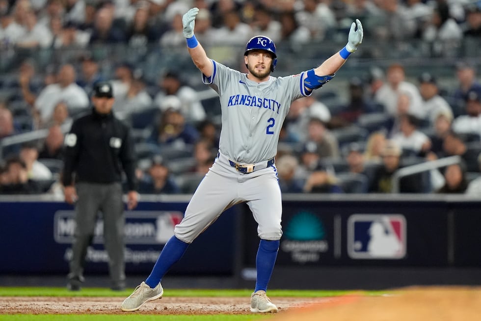 Kansas City Royals Garrett Hampson (2) reacts after driving in two runs against the New York...