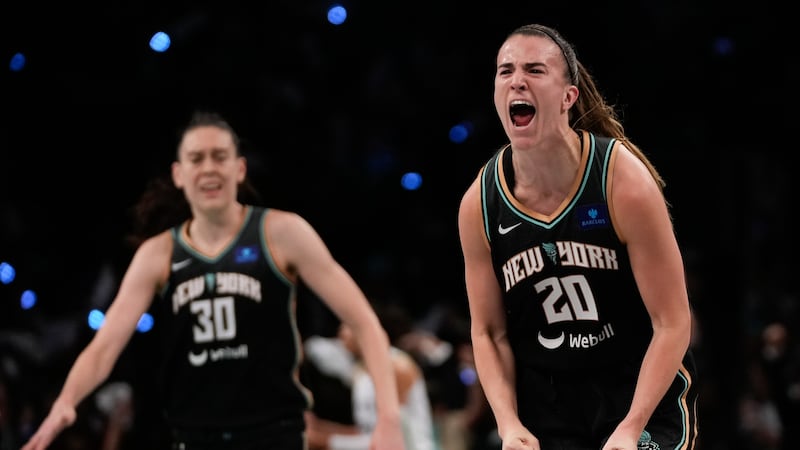New York Liberty guard Sabrina Ionescu (20) reacts after scoring against the Minnesota Lynx...