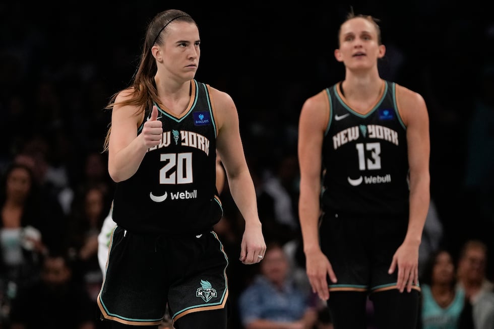 New York Liberty guard Sabrina Ionescu (20) reacts in overtime of Game 5 of the WNBA...